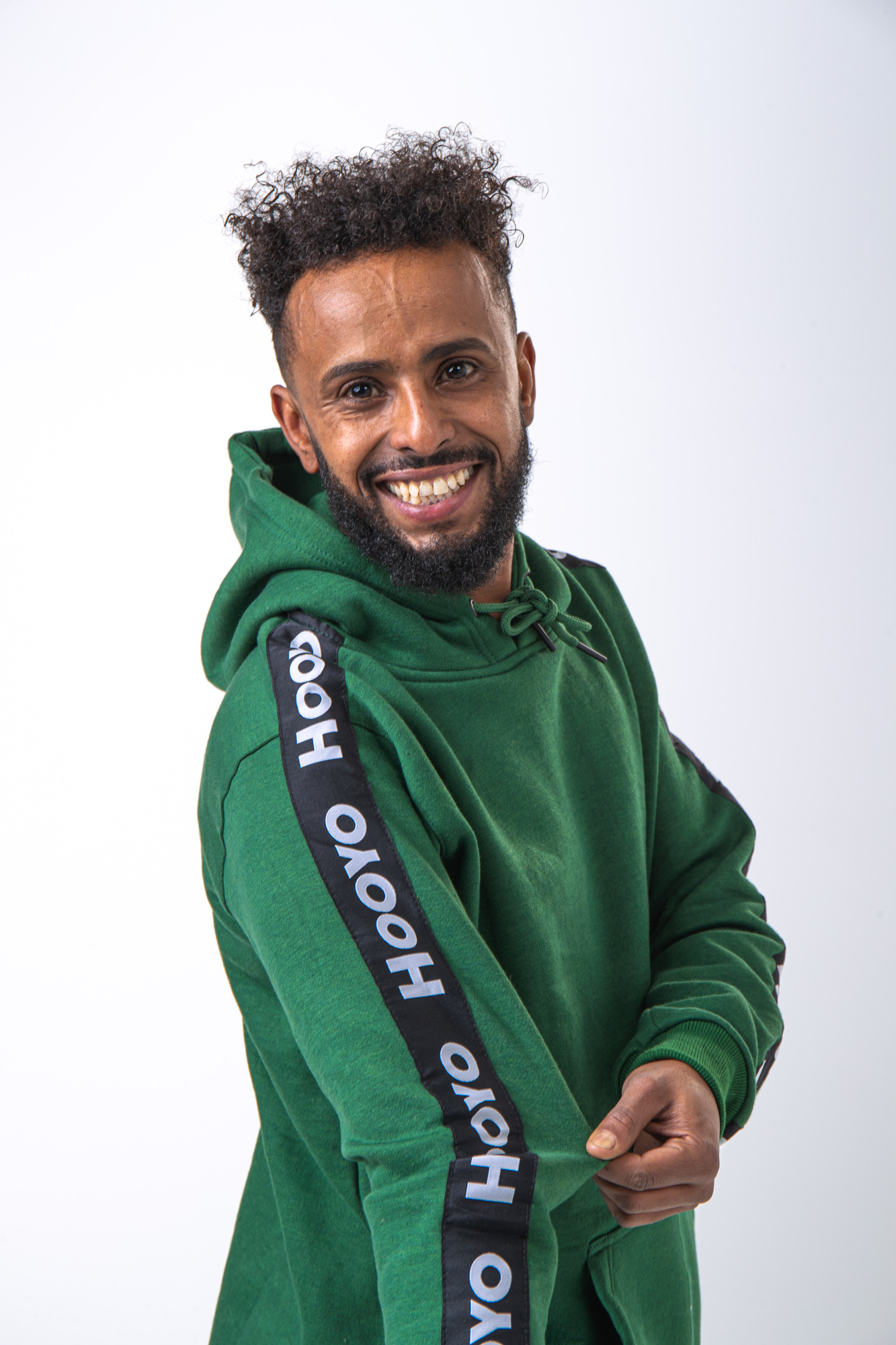 Hoody Man with Sleeves Stripe comes in Olive green. HOOYOSTREETWEAR